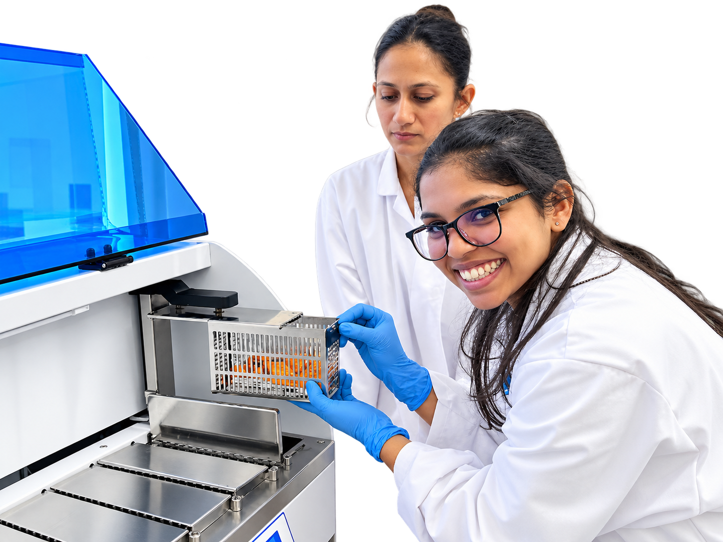 Biomed laboratory technicians operating an instrument at the bench